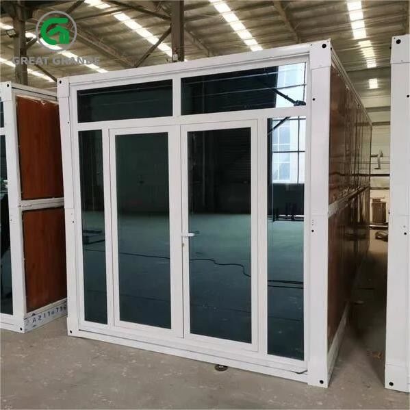 Parede de vidro de aço personalizada de Brown da porta da casa do recipiente da dobradura da casa pré-fabricada disponível para o arrendamento